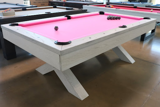 Custom pink pool table in the showroom of Trooper Billiards in Round Rock, Texas.