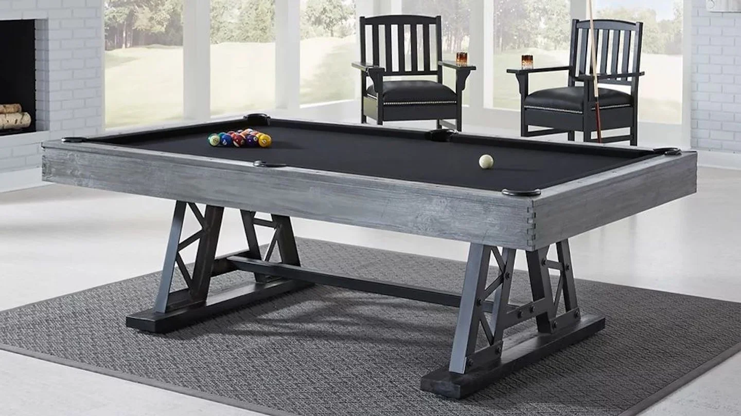 Custom pool table from Trooper Billiards displayed in a living room setting.