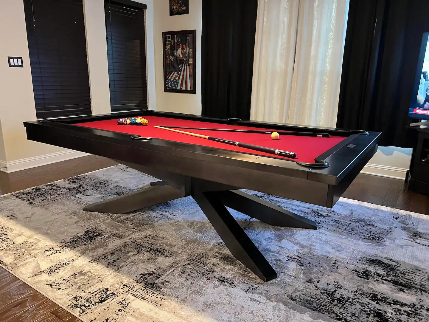 Felix Pool Table with red felt in a living room. Trooper Billiards pool table moving services.